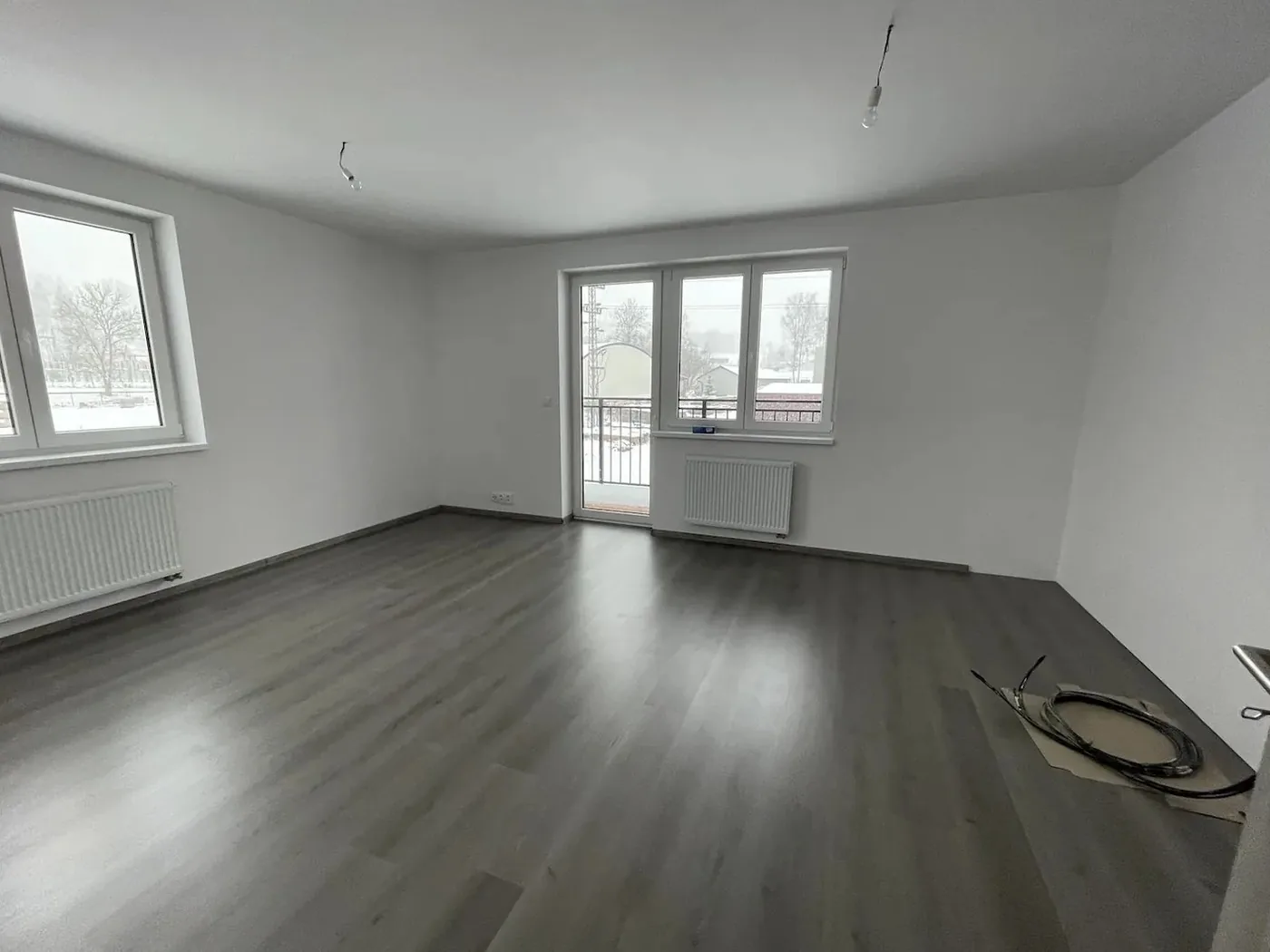 Obývací pokoj s balkonem – skutečný stav (Etapa I)